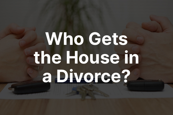 A picture of a couple talking with the words "who gets the house in a divorce?"